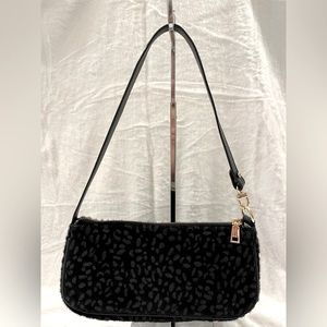 Black textured handbag